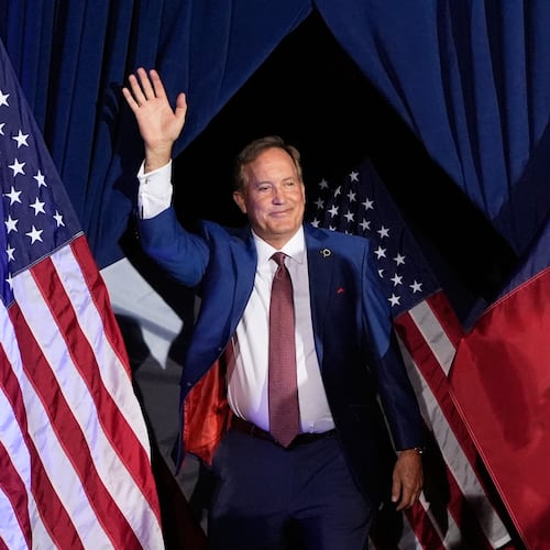 Texas Attorney General Ken Paxton, a Republican candidate for the U.S. Senate, waves as he takes the stage during a primary runoff election night event after winning the Republican party's nomination Tuesday, May 26, 2026, in Plano, Texas. (AP Photo/Tony Gutierrez)