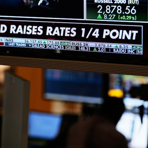 Screens display financial information on the floor at the New York Stock Exchange in New York, Wednesday, Sept. 16, 2026. (AP Photo/Seth Wenig)