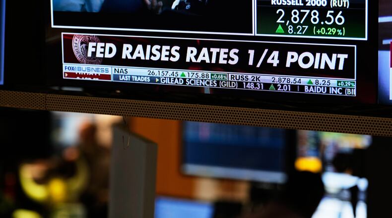 Screens display financial information on the floor at the New York Stock Exchange in New York, Wednesday, Sept. 16, 2026. (AP Photo/Seth Wenig)