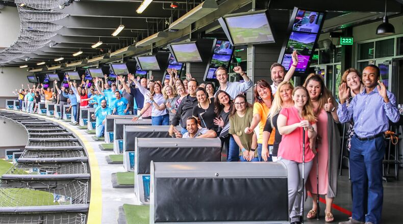 Topgolf in Alpharetta this spring hosted Play FORE Good, one of two golf-themed events that generated more than $100,000 for North Fulton Community Charities. DARYL O’HARE PHOTOGRAPHY