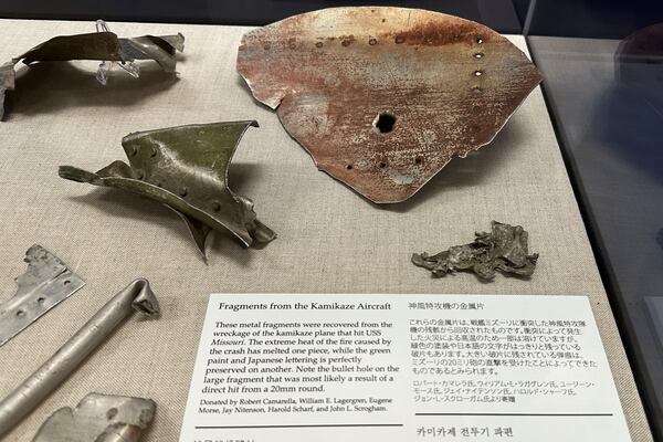 This April 3, 2025, photo taken at the Battleship Missouri Memorial in Pearl Harbor, Hawaii, shows fragments of the Japanese Zero fighter that a kamikaze pilot flew into the side of the USS Missouri during the Battle of Okinawa on April 11, 1945. (AP Photo/Audrey McAvoy)