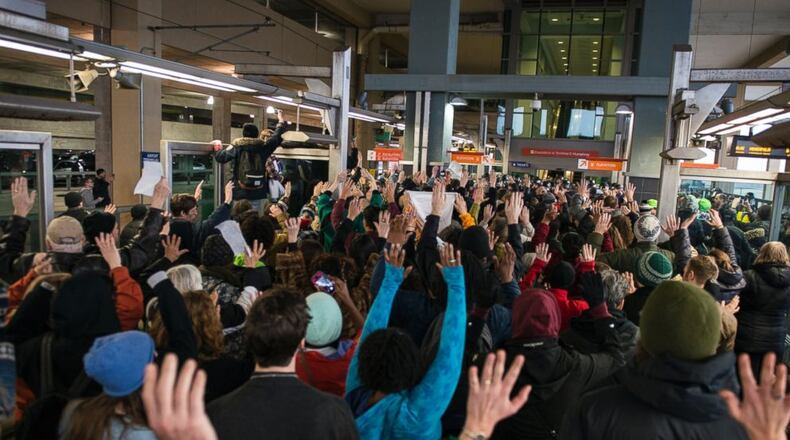 Protestors at Minneapolis-St. Paul International airport. Getty Images