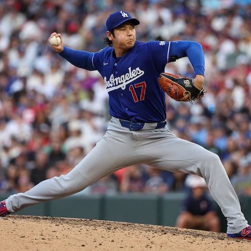 Los Angeles Dodgers starting pitcher Shohei Ohtani delivers against the Minnesota Twins during the sixth inning of a baseball game, Wednesday, June 24, 2026, in Minneapolis. (AP Photo/Matt Krohn)