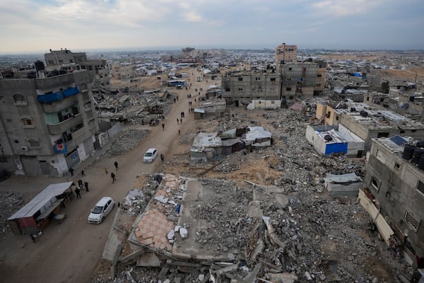 FILE - A tent camp for displaced Palestinians is set up amid destroyed buildings in the Khan Younis refugee camp, southern Gaza Strip, Jan. 4, 2025. (AP Photo/Abdel Kareem Hana, File)