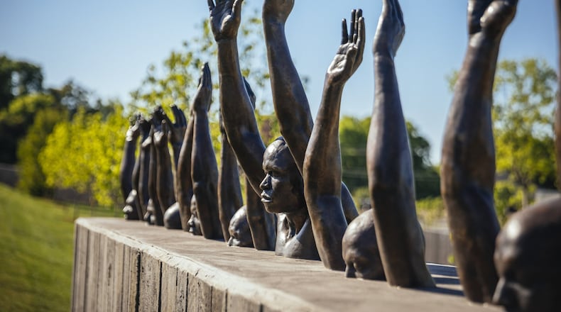“Raise Up,” a sculpture by Hank Willis Thomas, on the grounds of the new National Memorial for Peace and Justice in Montgomery. (Audra Melton/The New York Times)