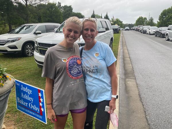 Mother and daughter, Carleigh Hyser and Kristin Gotham after voting at the Johns Creek Environmental Campus. (ADRIANNE MURCHISON/AJC)