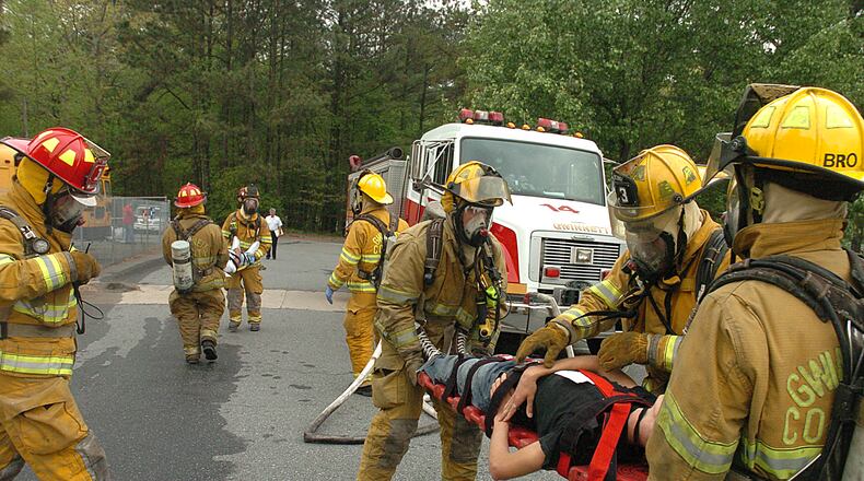 The Department of Homeland Security has increased federal funding for metro Atlanta to be prepared for a terrorist attack. Preparedness exercises like those undertaken by Gwinnett County fiirefighters in this 2006 photo can benefit from the funding. (NICK ARROYO/AJC)