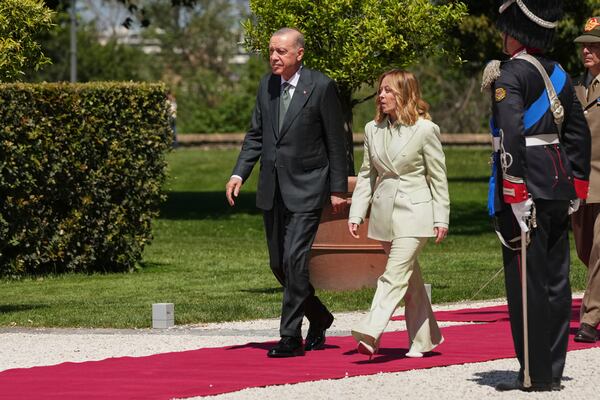 Turkey's President Recep Tayyip Erdogan, right, meets with Italian Prime Minister Giorgia Meloni at villa Doria Pamphilj, in Rome, Tuesday, April 29, 2025. (AP Photo/Francisco Seco)