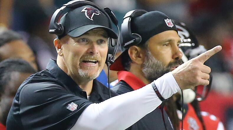 091415 ATLANTA: Falcons head coach Dan Quinn makes a point from the sidelines against the Eagles during the Monday Night Football game on Monday, Sept. 14, 2015, in Atlanta. Curtis Compton / ccompton@ajc.com