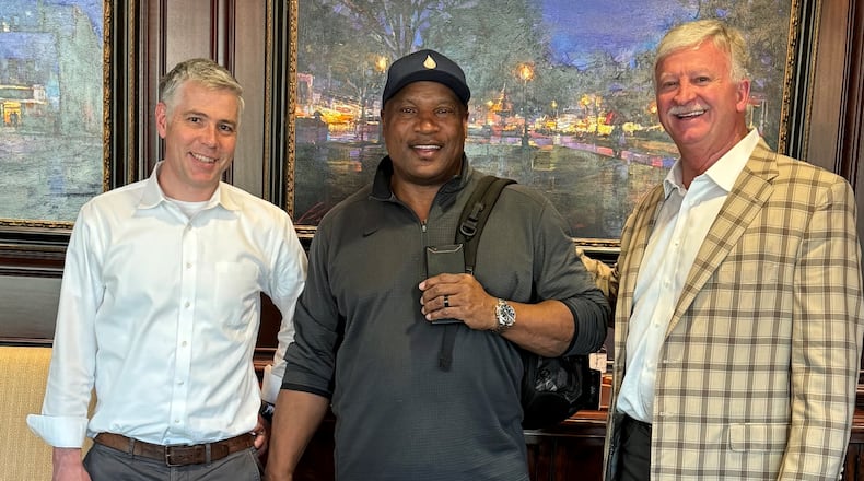 Sporting legend Vincent Edward "Bo" Jackson (center) with his Marietta-based attorneys David P. Conley (left) and Robert D. Ingram. On Feb. 2, Jackson was awarded just over $21 million by a Cobb County judge in his civil extortion case against his niece and nephew.