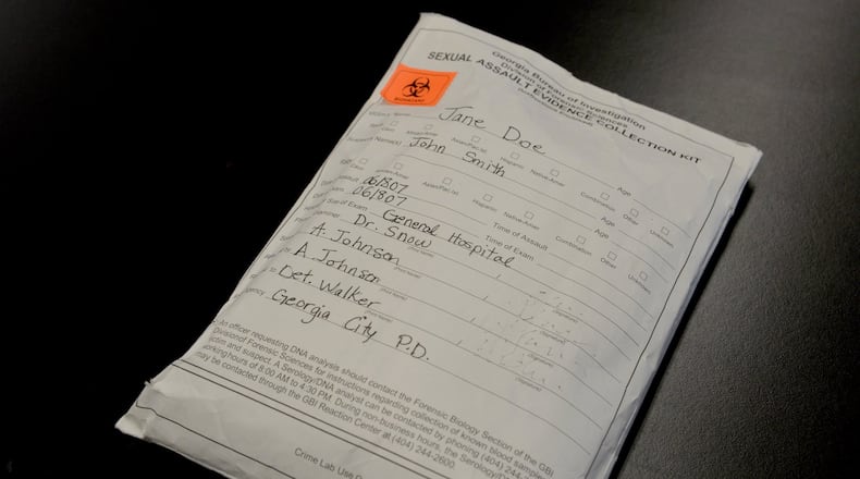 Sexual assault evidence collected from a victim’s body is stored in a “rape kit.” Samples such as bodily fluids or hair are placed in bags or envelopes, bundled together in packages like this one, and sent to the Georgia Bureau of Investigation for DNA testing. BRANT SANDERLIN/BSANDERLIN@AJC.COM