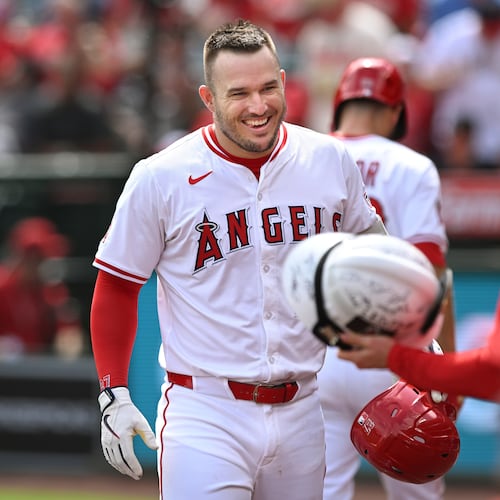FILE - Los Angeles Angels' Mike Trout celebrates after his solo home run against the Houston Astros during the first inning of a baseball game, Sept. 28, 2025, in Anaheim, Calif. (AP Photo/Wally Skalij, File)