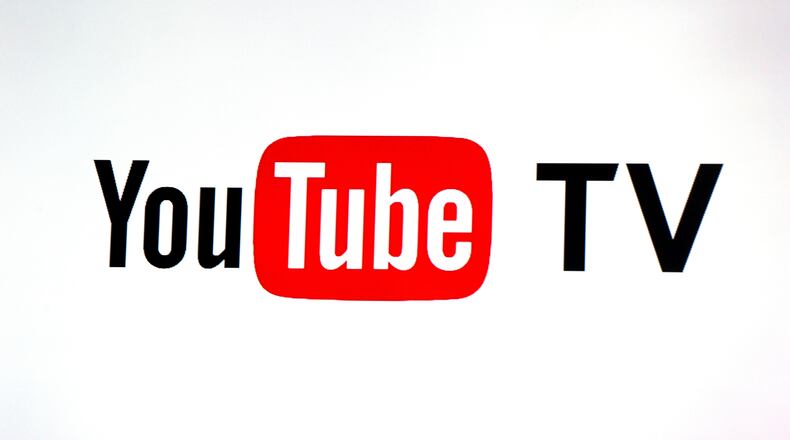 FILE - This Tuesday, Feb. 28, 2017, file photo shows the YouTube TV logo at the YouTube Space LA in Los Angeles. T (AP Photo/Reed Saxon, File)