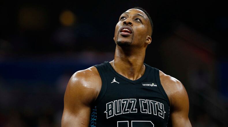 Dwight Howard will be traded from the Hornets to the Nets.