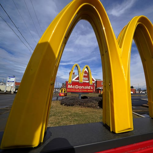 FILE - McDonald's restaurant signs are shown in in East Palestine, Ohio, Feb. 9, 2023. (AP Photo/Gene J. Puskar, File)