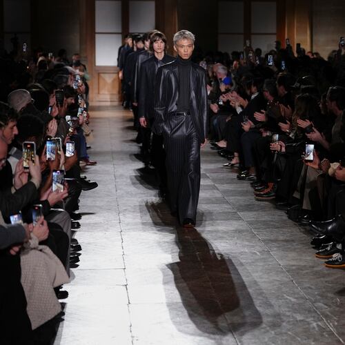 Models wear creations as part of the Hermes Fall/Winter 2026-2027 Men's collection presented in Paris, Saturday, Jan. 24, 2026. (AP Photo/Aurelien Morissard)