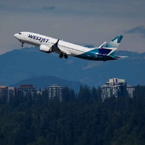 A WestJet Boeing 737 Max aircraft takes off from Vancouver International Airport in Richmond, British Columbia, Canada, on Friday, July 31, 2026. (Darryl Dyck/The Canadian Press via AP)