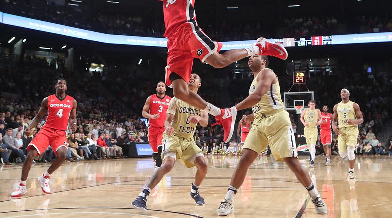 December 20, 2016, ATLANTA: Georgia guard J.J. Frazier soars for two points over Georgia Tech guards Justin Moore (left) and Corey Heyward in a NCAA college basketball game on Tuesday, Dec. 20, 2016, in Atlanta. Curtis Compton/ccompton@ajc.com
