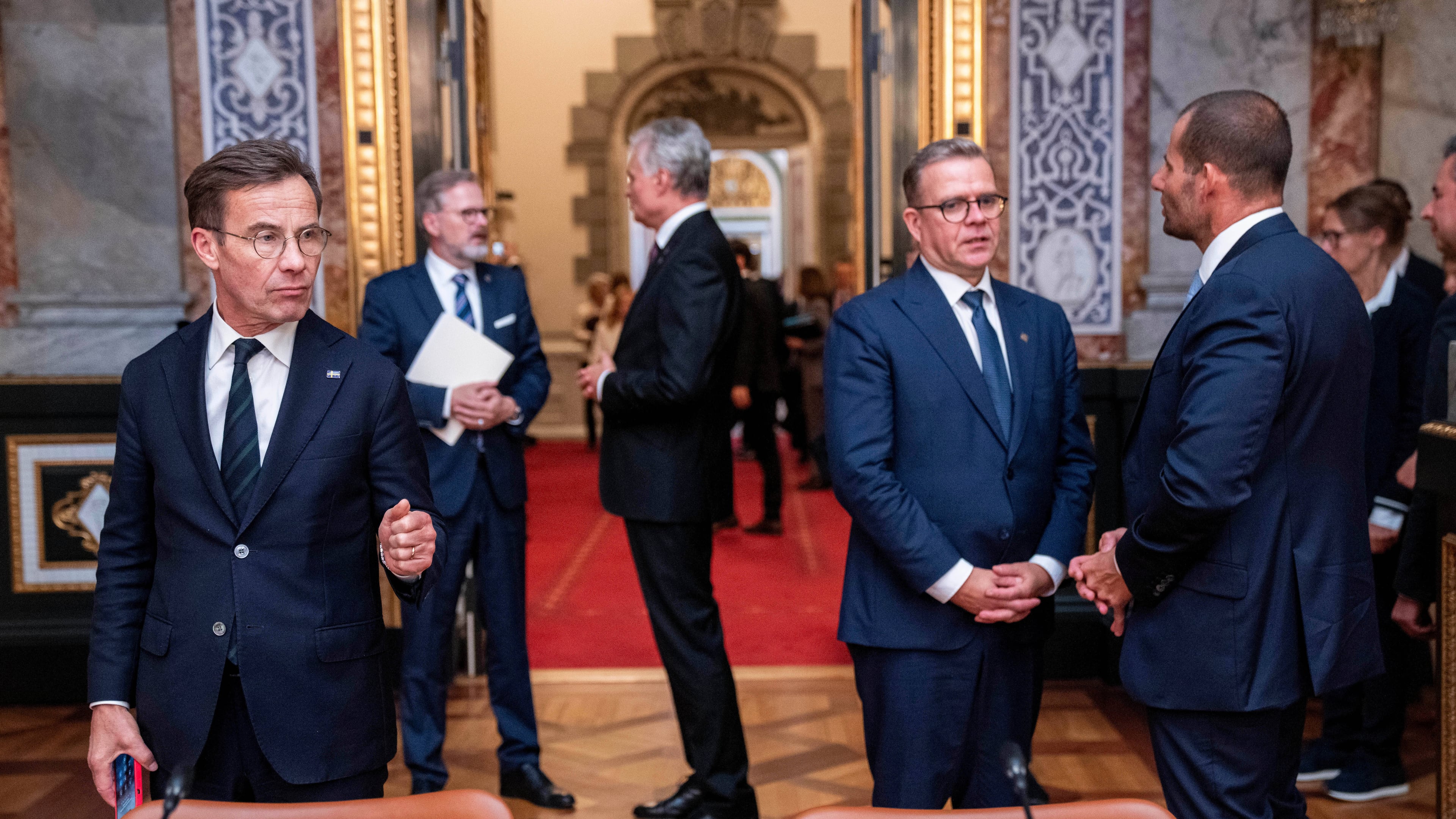 Sweden's Prime Minister, Ulf Kristersson, left, Finland's Prime Minister, Petteri Orpo, second from right, and Malta's Prime Minister, Robert Abela at the Danish parliament at Christiansborg Castle in Copenhagen as Denmark is hosting an informal summit for the EUs heads of state and government, Wednesday, Oct. 1, 2025 . (Ida Marie Odgaard/Ritzau Scanpix via AP)