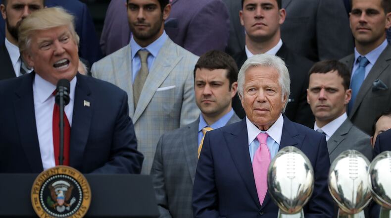 WASHINGTON, DC - APRIL 19: New England Patriots owner Robert Kraft (C) listens to U.S. President Donald Trump deliver remarks during an event celebrating the team's Super Bowl win on the South Lawn at the White House April 19, 2017 in Washington, DC. It was the team's fifth Super Bowl victory since 1960. (Photo by Chip Somodevilla/Getty Images)