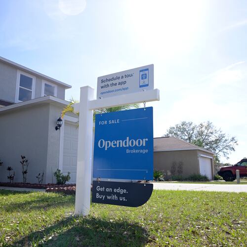 FILE - Real estate signs are posted outside homes for sale, Feb. 21, 2023, in Valrico, Fla. (AP Photo/Phelan M. Ebenhack, File)