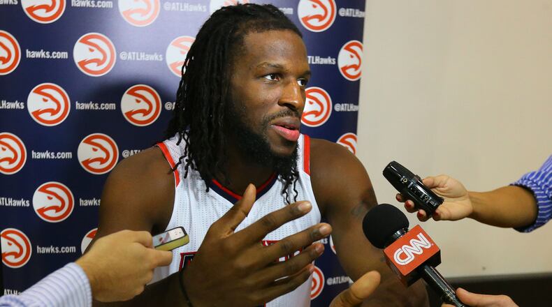 092914 ATLANTA: Hawks forward DeMarre Carroll says he doesn't believe that general manager Danny Ferry is a racist and hopes he returns to the team during Media Day at Philips Arena on Monday, Sept. 29, 2014, in Atlanta. CURTIS COMPTON / CCOMPTON@AJC.COM Hawks forward DeMarre Carroll sat out Monday's exhibition win over the Pelicans with a right ankle injury.