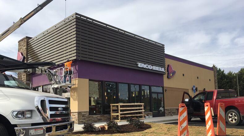 Recent and current construction on Scenic Highway in Snellville and Lawrenceville has included a new Cook Out restaurant, an upcoming Cracker Barrel and a soon-to-open dine-in movie theater. TYLER ESTEP / TYLER.ESTEP@COXINC.COM