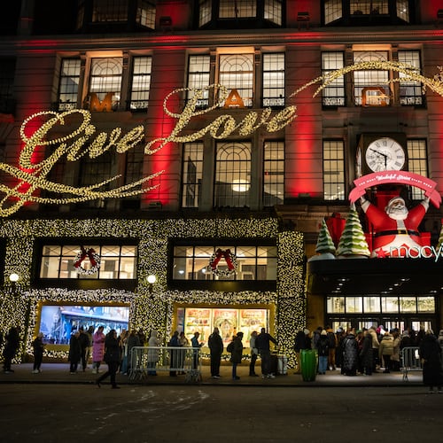 Black Friday Shoppers wait in line to enter Macy's flagship store on Friday, Nov. 28, 2025 in New York. (AP Photo/Angelina Katsanis)