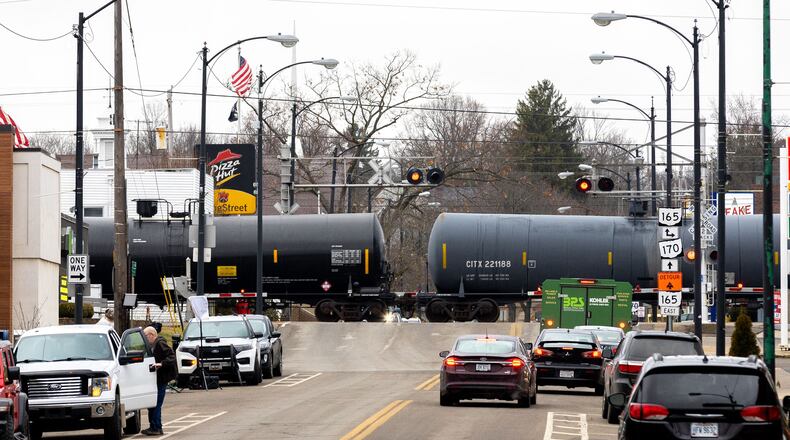 A train passes through East Palestine, Ohio, on Feb. 17, 2023. (Arvin Temkar/Atlanta Journal-Constitution/TNS)
