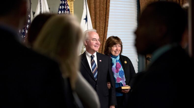 Human Services Secretary Tom Price and his wife Betty pose for a photos following a swearing in ceremony in the Eisenhower Executive Office Building in the White House complex in Washington, Friday, Feb. 10, 2017. (AP Photo/Andrew Harnik)