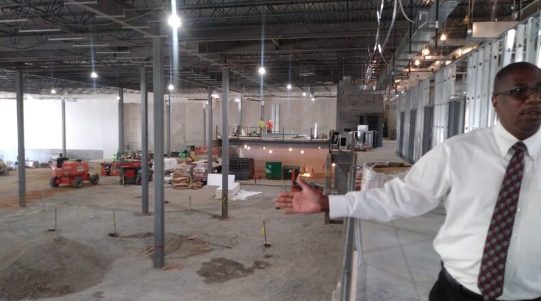 Norcross Mayor Craig Newton discussing new Birchwood Food facility with executives. (Courtesy Norcross Economic Development)