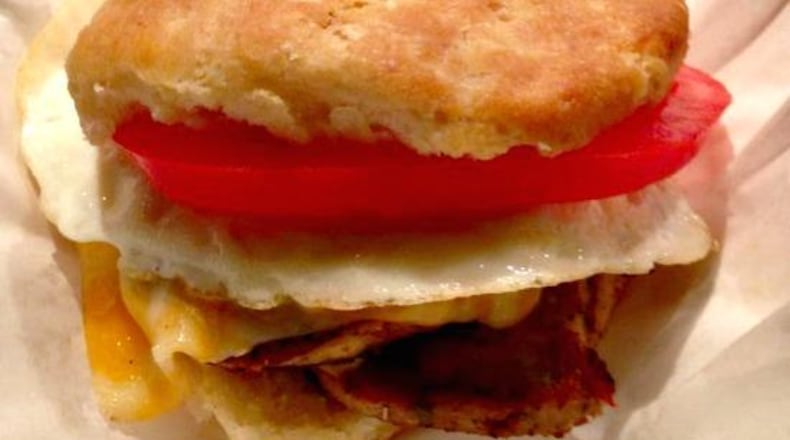 Fluffy biscuit, salty ham, airy eggs and a side of buttered grits at Red Eyed Mule.