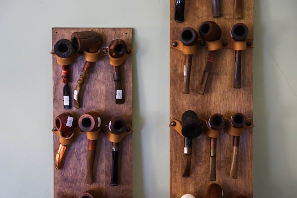 Pipes belonging to Carley are part of his estate sale. (Abbey Cutrer/AJC)