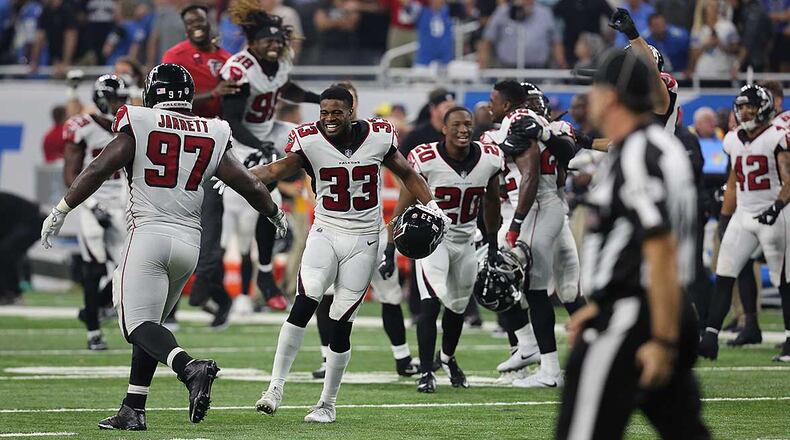 Game 3 -- Falcons 30, Lions 26: The Falcons celebrate on the field after an apparent game-winning touchdown for the Lions was overturned on the final play. Kicker Matt Bryant tweeted after the game: 'First time in my 16-year career where at the end of the game I had to ask 'did we win?' (Rey Del Rio/Getty Images)