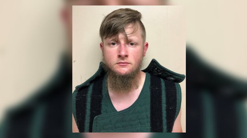 Robert Aaron Long, 21, of Woodstock, was arrested in Crisp County and charged with murder in the case of three separate shootings that left eight people dead.