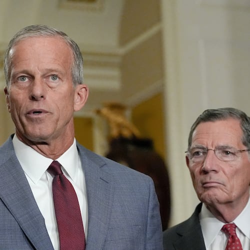 Sen. Majority Leader John Thune, R-S.D., left, speaks as Sen. John Barrasso, R-Wyo., listens during a news conference after a policy luncheon on Capitol Hill, Wednesday, July 29, 2026, in Washington. (AP Photo/Mariam Zuhaib)