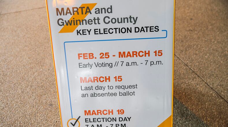 A sign indicating the MARTA and Gwinnett County transit referendum voting calendar is displayed at the Doraville MARTA Transit Station in Doraville in the days leading up to the vote. ALYSSA POINTER/ALYSSA.POINTER@AJC.COM)