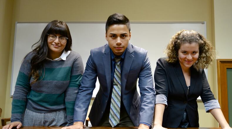 Freedom University students Ashley Rivas-Triana, left, Salvador Alvarado-Linares, center, and Susana Ramirez, right, have joined forces with a multi-racial coalition of students protesting Georgia s college admission policies and drafting a United New Appeal for Human Rights. 2015 Photo: Laura Emiko Soltis/Freedom University.