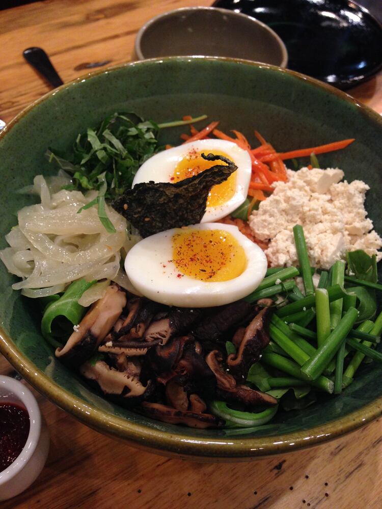 Bi bim bap, made with kimchi-reddened rice