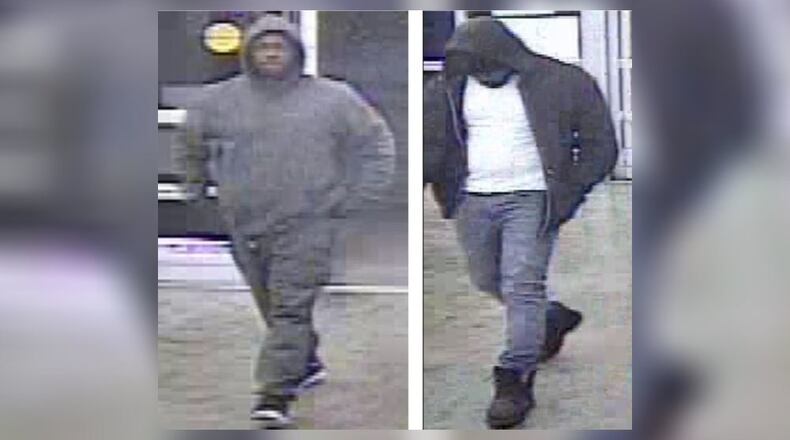 Police are searching for two men believed to be responsible for a string of vehicle break-ins outside a Lawrenceville gym.