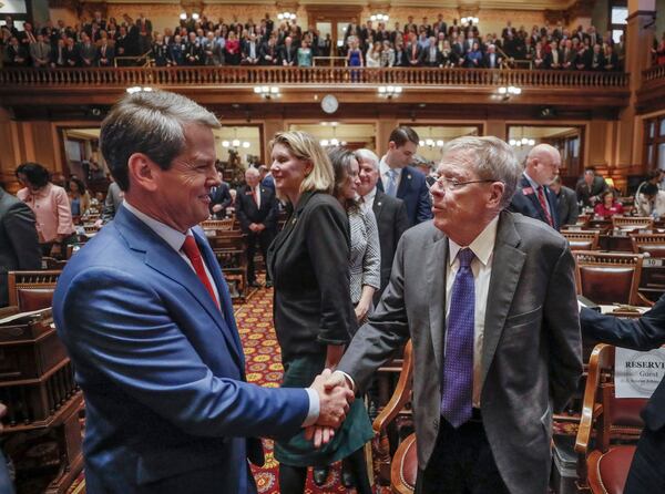 Carr said that Gov. Brian Kemp, left, and former U.S. Sen. Johnny Isakson are the best retail politicians he has ever seen, and views each as a role model. Bob Andres / bandres@ajc.com