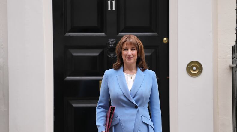 Britain's Chancellor of the Exchequer Rachel Reeves leaves 11 Downing Street to deliver the Spring Statement in London, Tuesday, March 3, 2026.(AP Photo/Kin Cheung)
