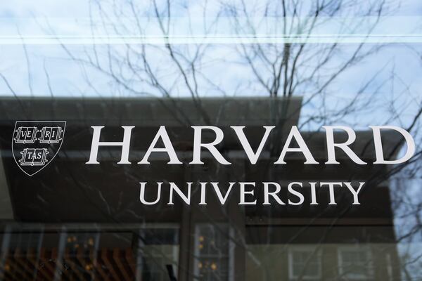 The Harvard University logo is displayed on a building at the school, Tuesday, April 15, 2025, in Cambridge, Mass. (AP Photo/Charles Krupa)