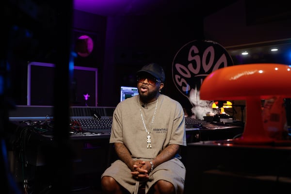“I’m in this lifestyle more than any other CEO you see in labels... You don’t see them breaking the records the way (I do). They leave that to somebody else," says Dupri, shown in his studio in Atlanta. (Natrice Miller/AJC)