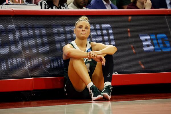 Michigan State's Theryn Hallock (4) looks at the scoreboard during the second half against North Carolina State in the second round of the NCAA college basketball tournament in Raleigh, N.C., Monday, March 24, 2025. (AP Photo/Karl DeBlaker)