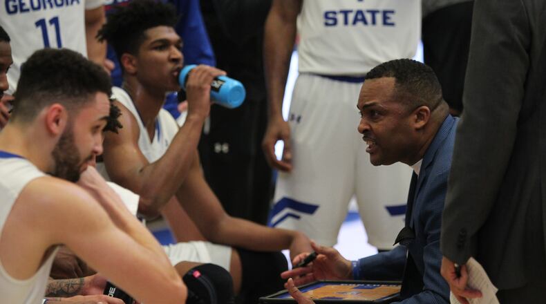 Georgia State coach Ron Hunter sits down with his team during a timeout to point out how to survive the final minutes of the game in a Sun Belt Conference college basketball game between Georgia State University and Appalachian State University in Atlanta, Georgia, on Monday, January 23, 2017. (HENRY TAYLOR / HENRY.TAYLOR@AJC.COM)
