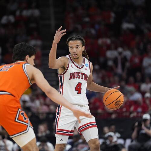 Houston guard Kingston Flemings (4) directs his teammates during the first half of a Sweet 16 game in the NCAA college basketball tournament Thursday, March 26, 2026, in Houston. (Ashley Landis/AP)