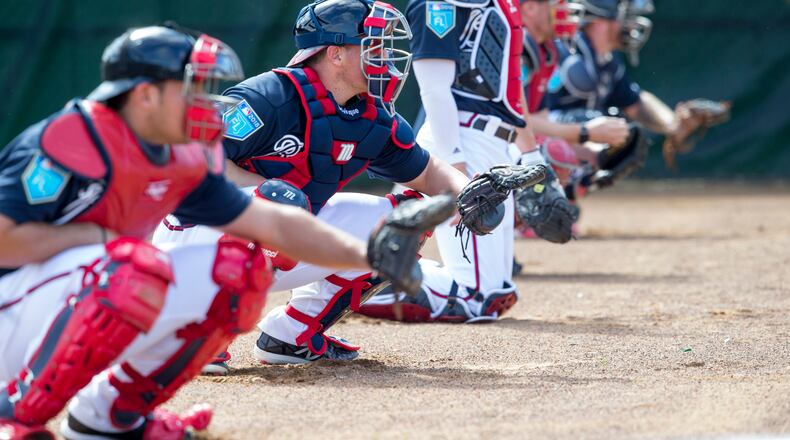 Atlanta Braves catchers are shown at baseball spring training in Kissimmee, Fla., Wednesday, Feb. 14, 2018. (AP Photo/Willie J. Allen Jr.)