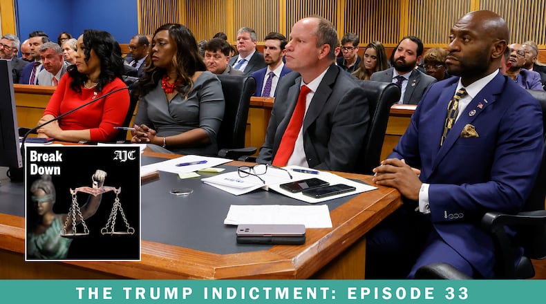 The latest episode of the AJC's "Breakdown" podcast recaps the closing arguments as to whether DA Fani Willis' office should be disqualified from the Georgia election interference case. Here, Willis, prosecutor Daysha Young, attorney Andrew Evans and special prosecutor Nathan Wade listen at the hearing for those arguments. (Alex Slitz/AP)