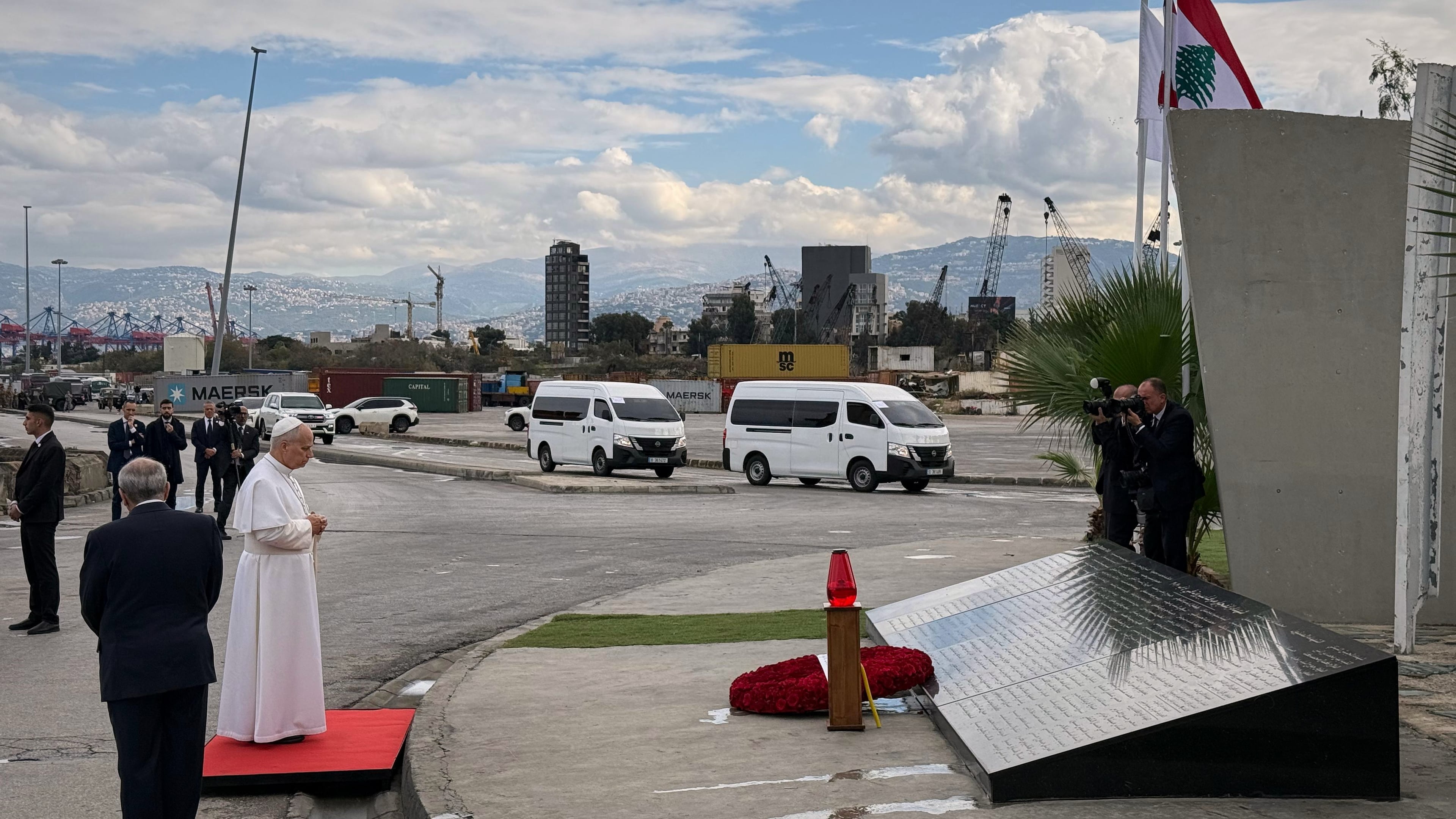 Pope Leo XIV prays at a memorial for the victims of the 2020 Beirut port explosion at the site off the explosion in Beirut, Lebanon, Tuesday, Dec. 2, 2025. (AP Photo/Fadi Tawil)